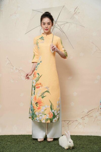 mẫu áo dài cách tân vàng tà ngắn