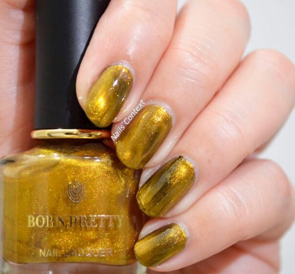 Top những Mẫu nail móng mắt mèo ánh vàng