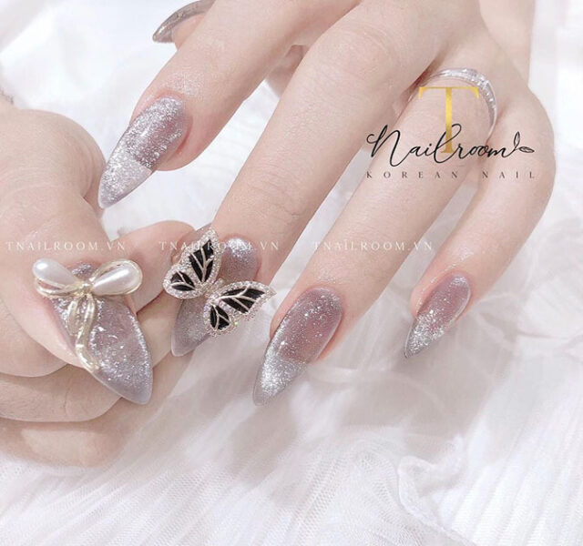 mẫu nail mắt mèo trắng kim tuyến