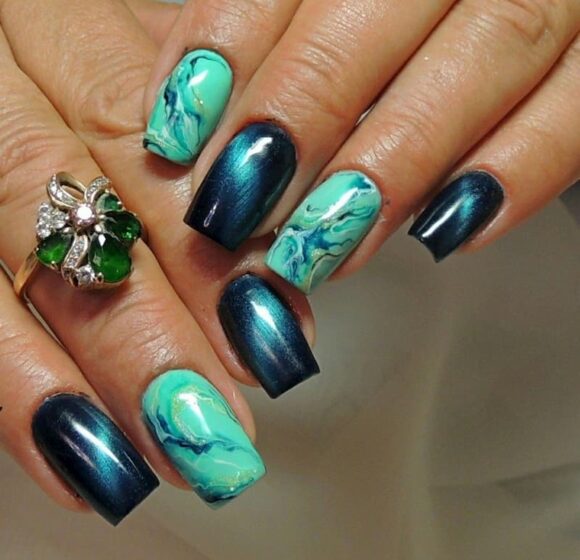 Top những Mẫu nail móng mắt mèo xanh đen